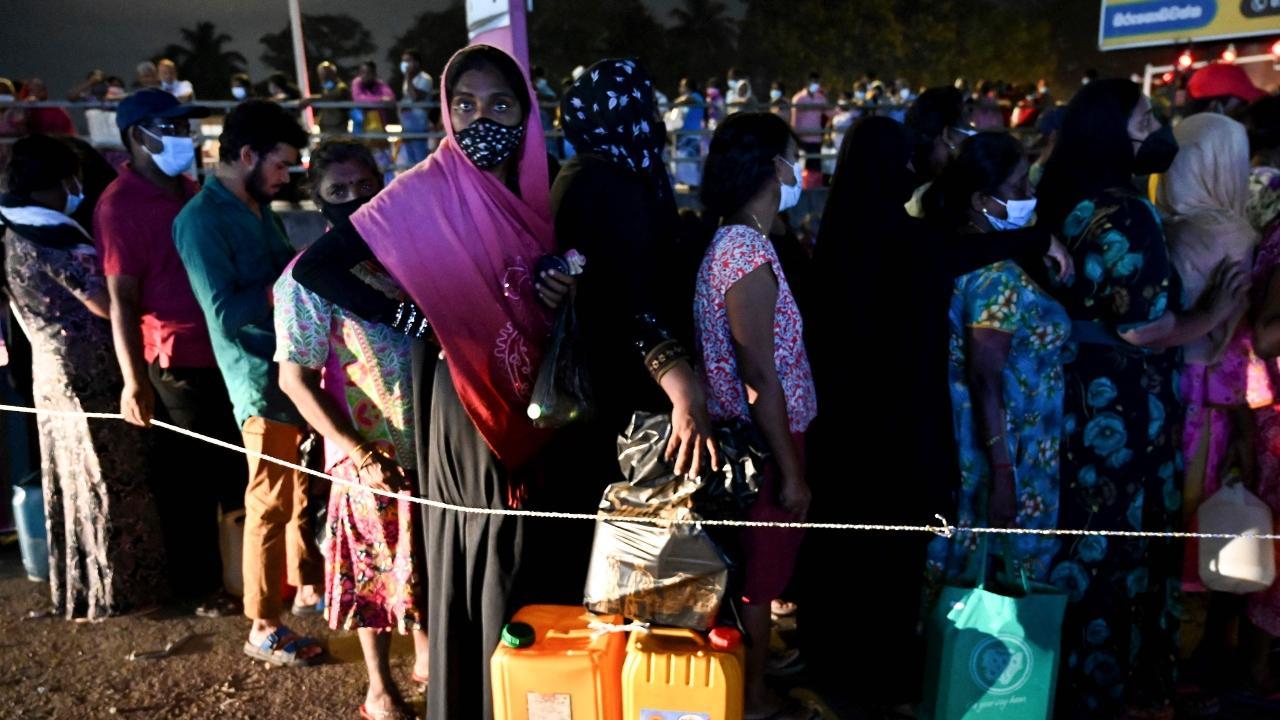 China turns its back on Sri Lanka economic crisis: Report People stand in a queue to buy kerosene oil for home use at a petrol station in Colombo on March 22, 2022. Pic/AFP
